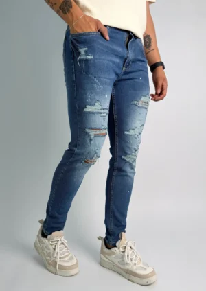 Jean Slim Tiro Medio Azul Neutro Claro con Rotos para Hombre